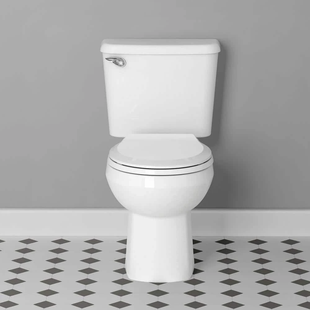 American Standard Reliant Two-Piece 10 In Rough 1.28 GPF Single Flush Round Standard Height Toilet With Slow-Close Seat In White 7 American Standard Reliant Two-Piece 10 In Rough 1.28 GPF Single Flush Round Standard Height Toilet With Slow-Close Seat In White - Image 7